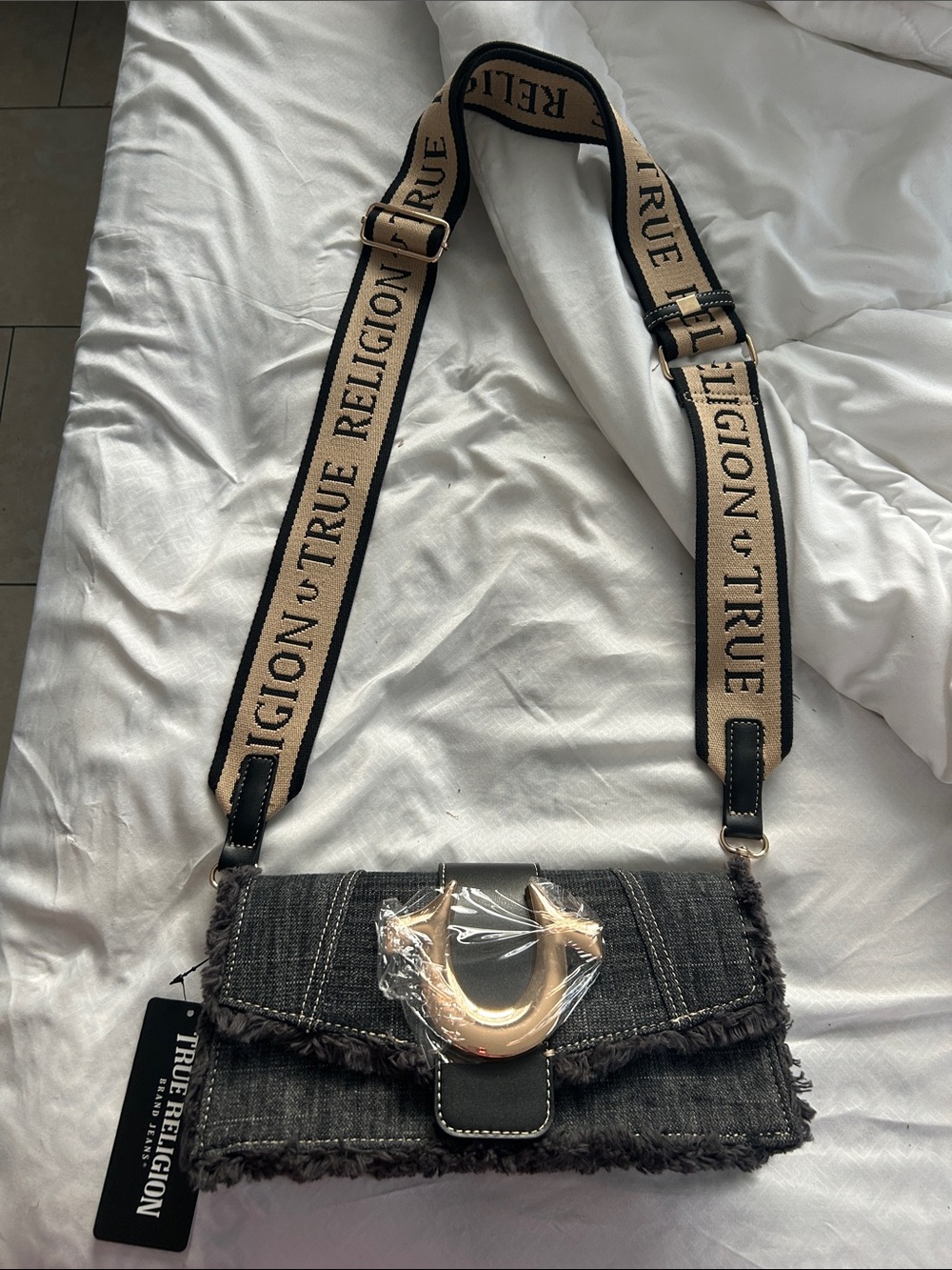 True Religion Black Denim Fringe Crossbody with Beige Logo Strap